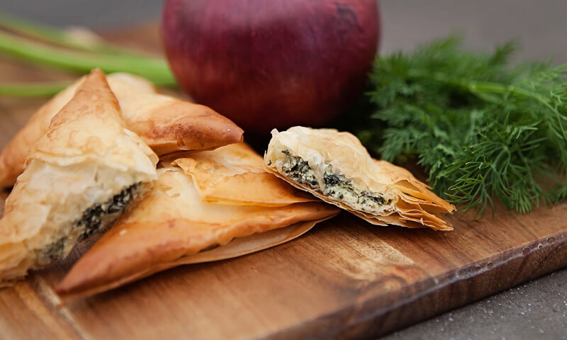 Greek meze spanakopita on grazing table Pete the Greek